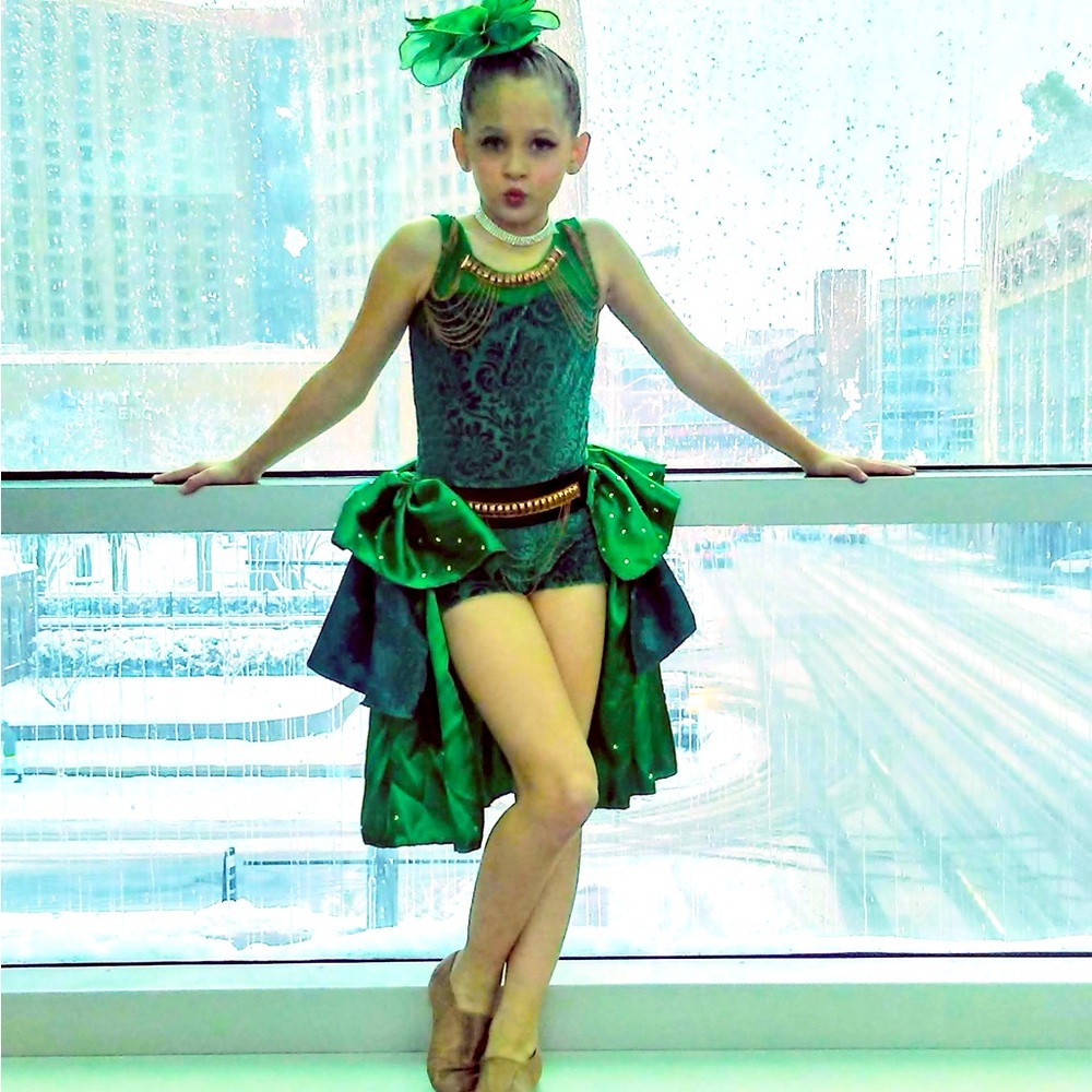 Musical theatre one piece with bustle skirt attachment and hair piece.